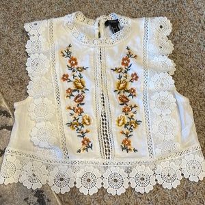 Cute crop top with embroidery and lace details